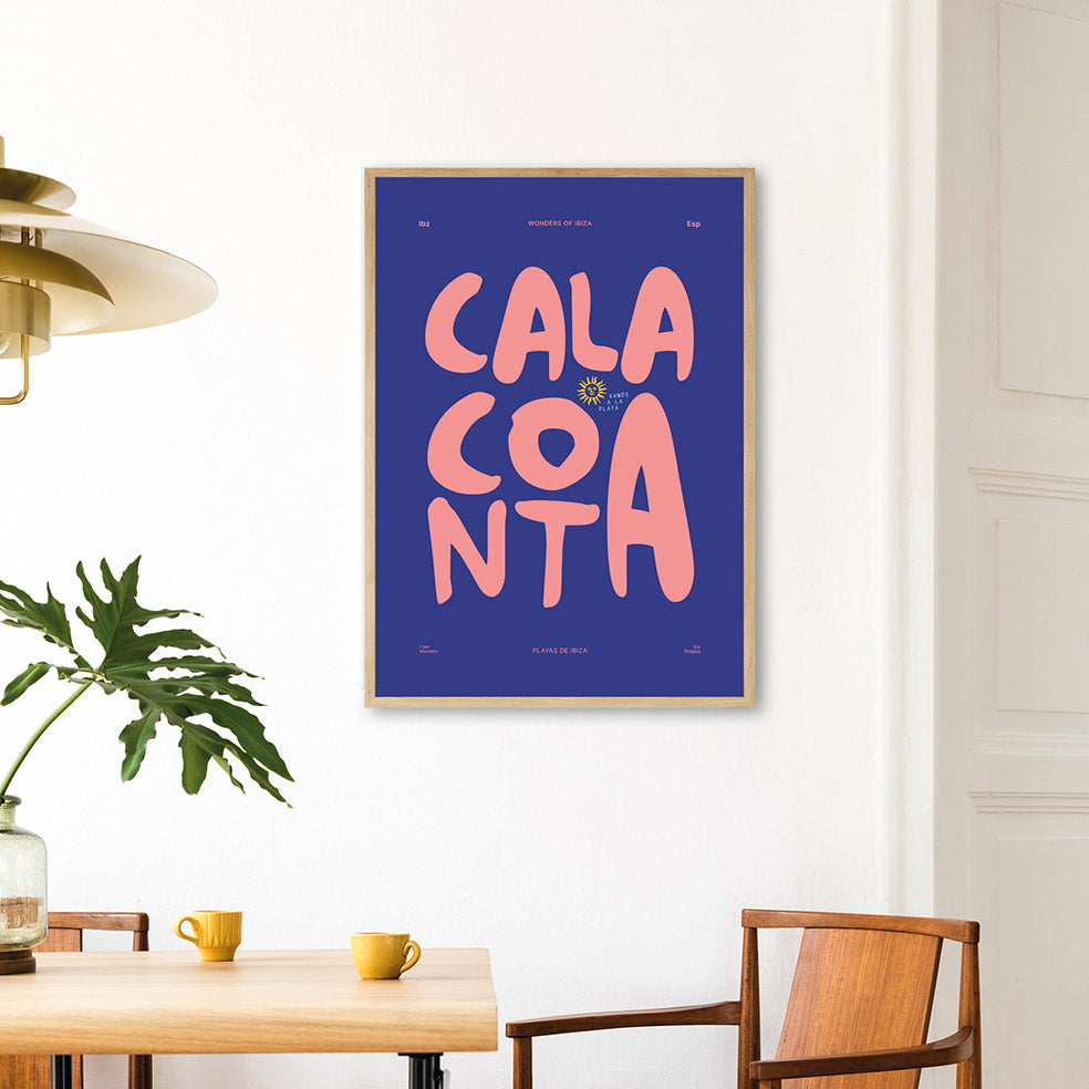 Framed Minimal style Ibiza typography print with the words Cala Conta in peachy pink on a purple background. 