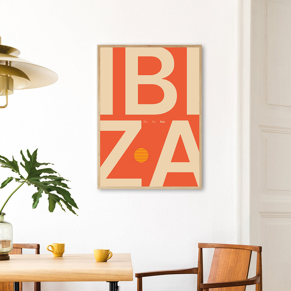Framed Minimal style Ibiza typography print with the word Ibiza in soft red and sandy colours. 