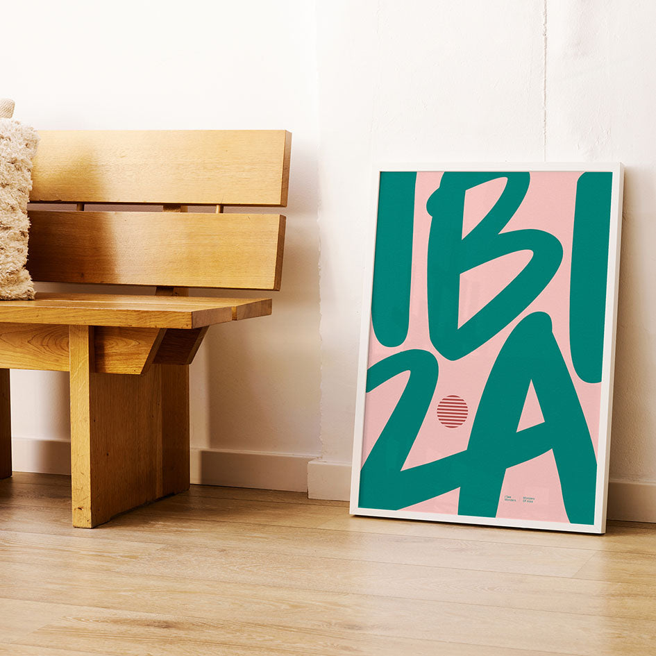 Framed Minimal style Ibiza typography print with the word Ibiza in rich golden pink and green colours.