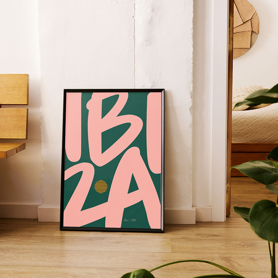 Framed Minimal style Ibiza typography print with the word Ibiza in golden peach and rich green colours.