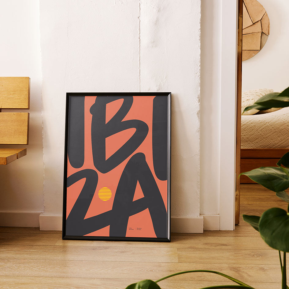 Framed Minimal style Ibiza typography print with the word Ibiza in terracotta and rich charcoal colours.