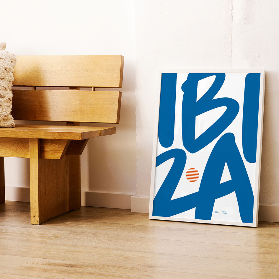 Framed Minimal style Ibiza typography print with the word Ibiza in white and rich blue colours. 