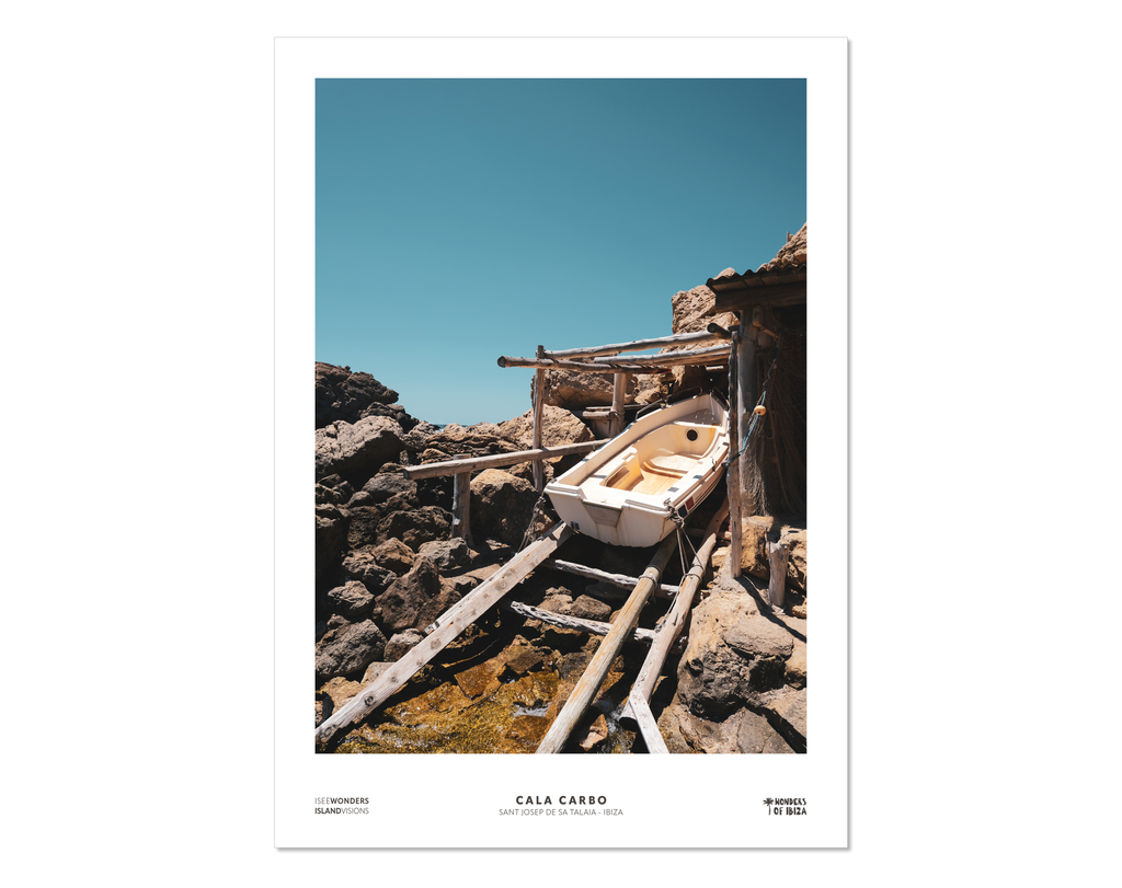 Photographic print featuring a boat moored up by rocks at a traditional fisherman's hut, Cala Carbo, Ibiza.  