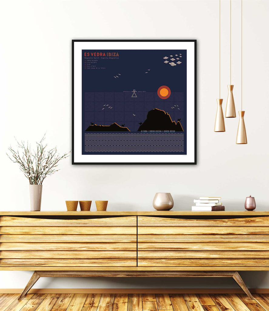 Framed graphic design giclée art print of Es Vedra, Ibiza at twilight in living space