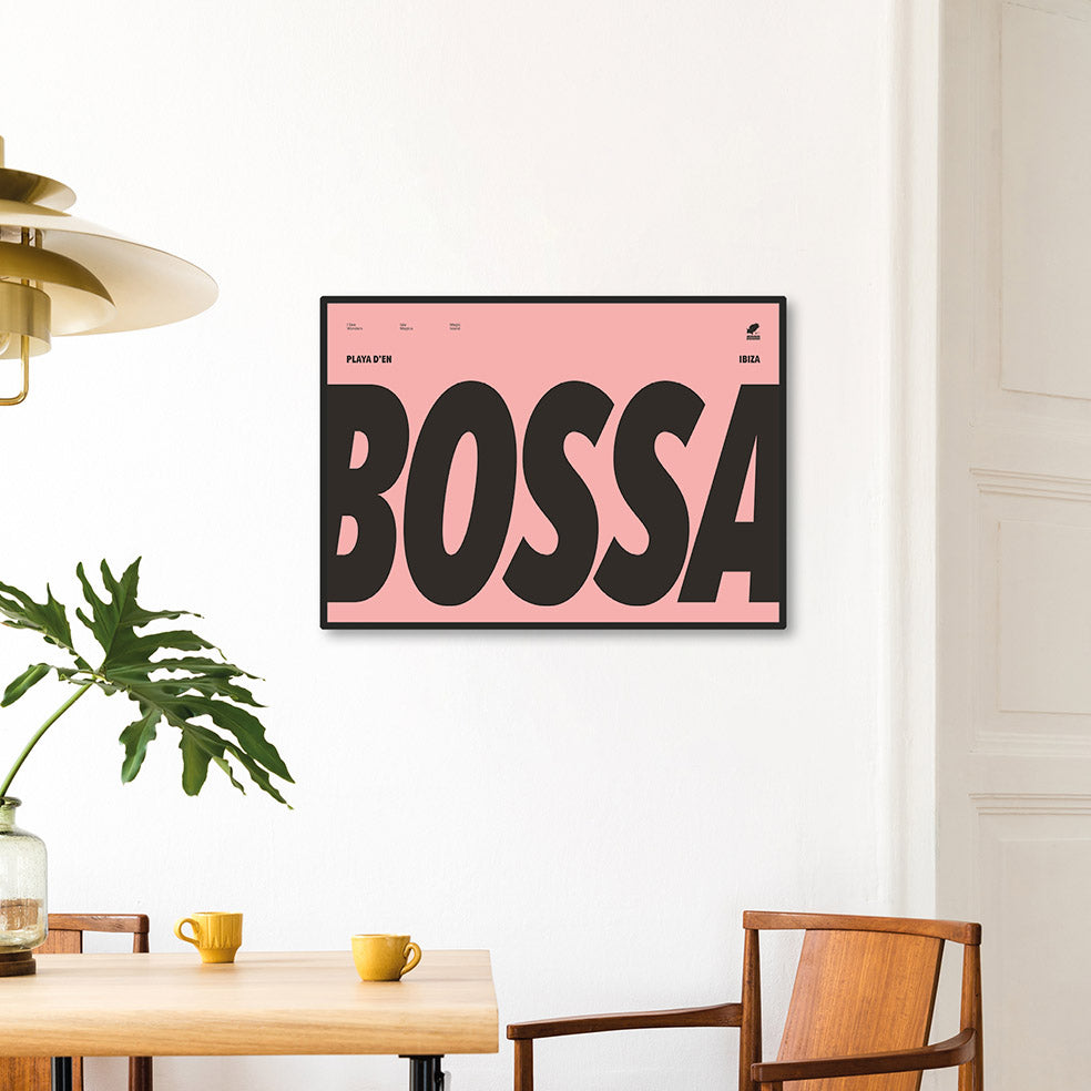 Framed Minimal style Ibiza typography print with the word Bossa for Playa d'en Bossa in off black on a pink background