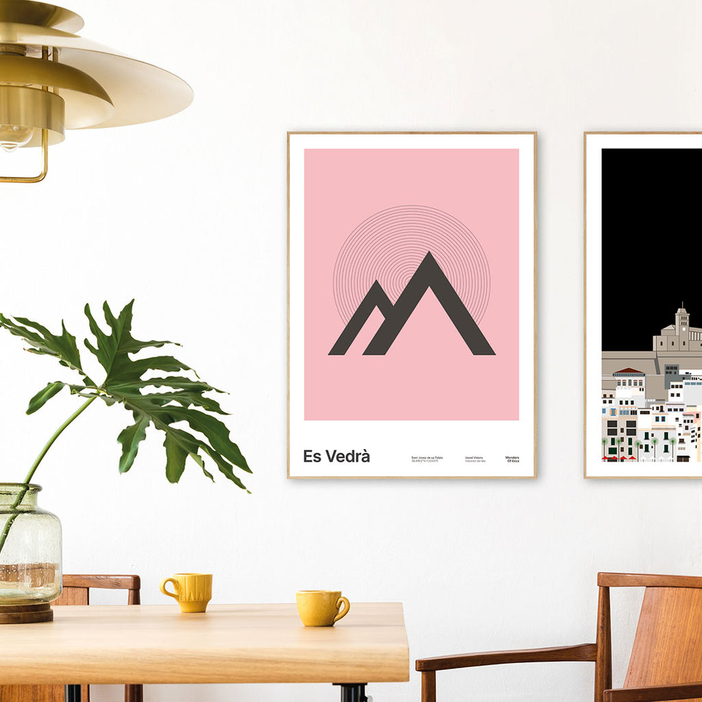Framed Minimal style graphic design Ibiza art print of Es Vedra, Ibiza represented as triangles on a pink background.  