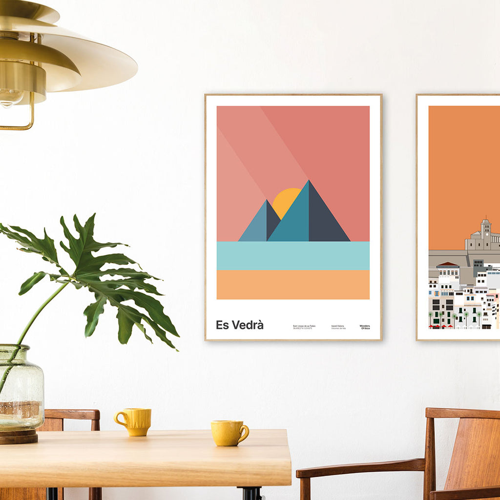 Framed Minimal style graphic design Ibiza art print of Es Vedra, Ibiza represented as blue pyramids on a light red sky background.