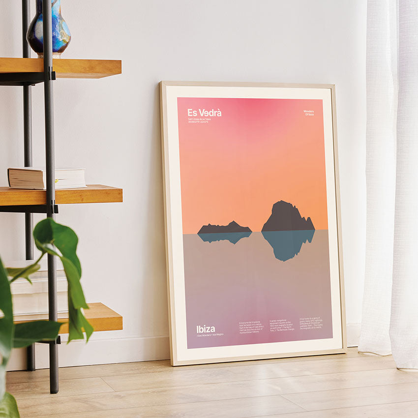 Framed Minimal style art print of Es Vedra. A print of Es Vedra, Ibiza amidst a lush, fantastical, magical sunset.