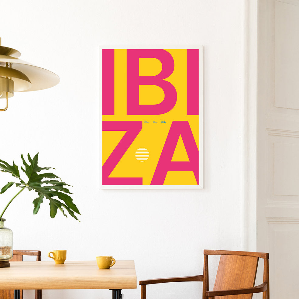 Framed Minimal style Ibiza typography print with the word Ibiza in yell and pink colours.