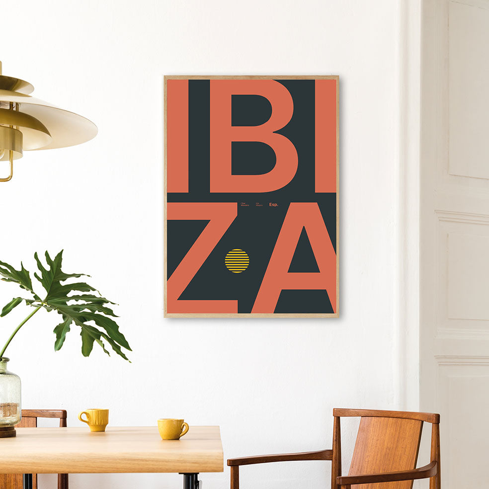 Framed Minimal style Ibiza typography print with the word Ibiza in warm colours on a dark, rich backdrop.