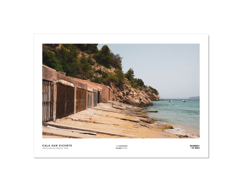 Photographic print featuring fishermen's huts at Cala San Vicente beach, Ibiza.  