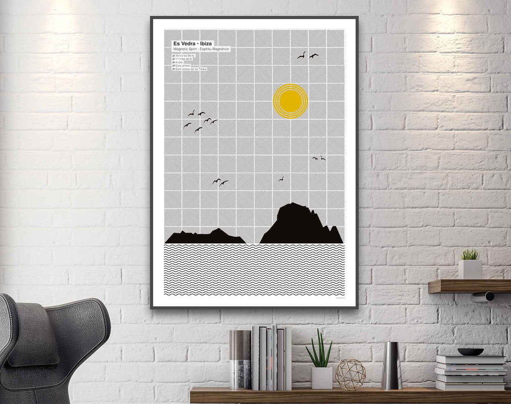 Framed graphic design giclée art print of Es Vedra, Ibiza on wall in living space