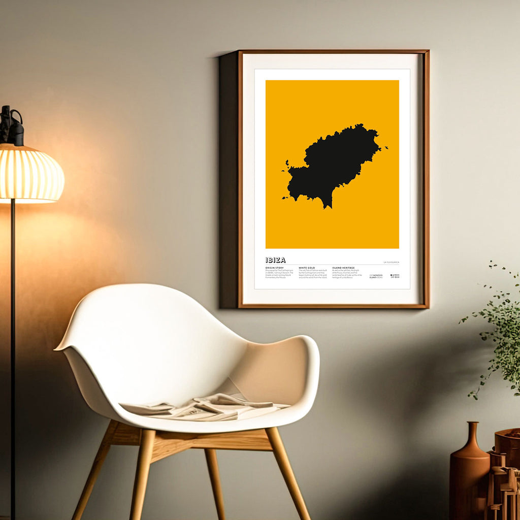 Framed Minimal style graphic design art print of the island of Ibiza from above in black with a rich yellow background.  